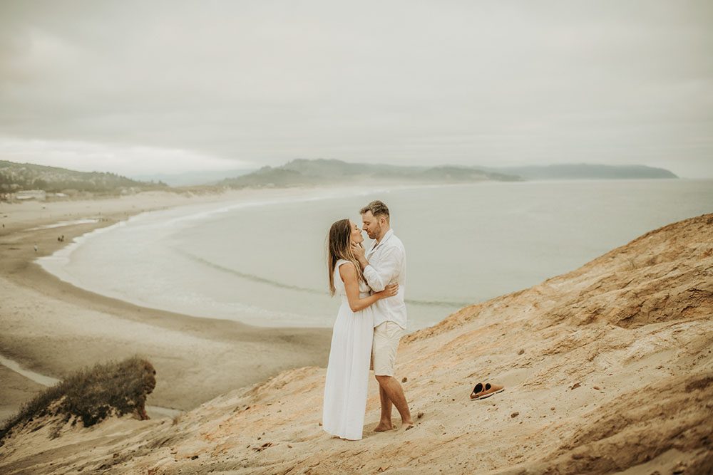 Engagement photos at Cape Kiwanda Pacific City Oregon